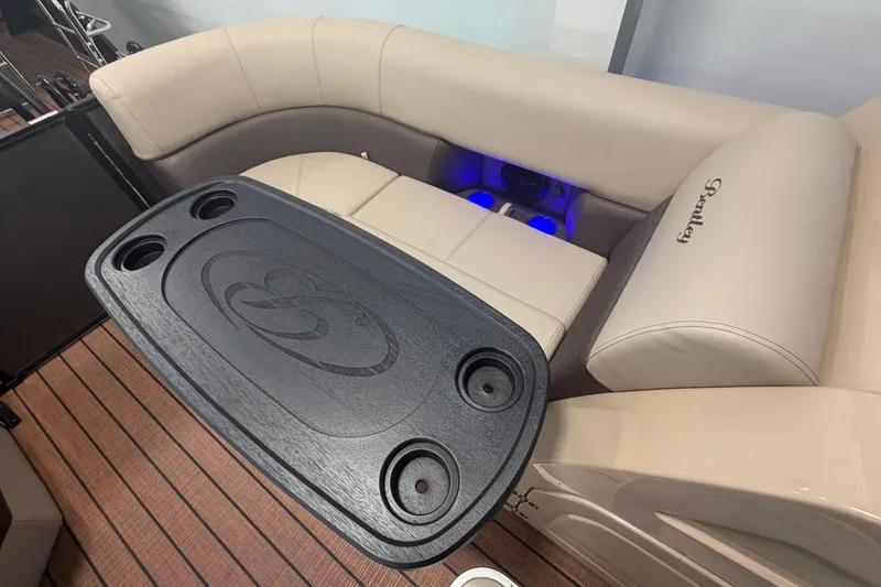 Slide: The Image of Interior of 2026 Bentley Pontoons Elite 223 Swingback with table and seating area. - 22