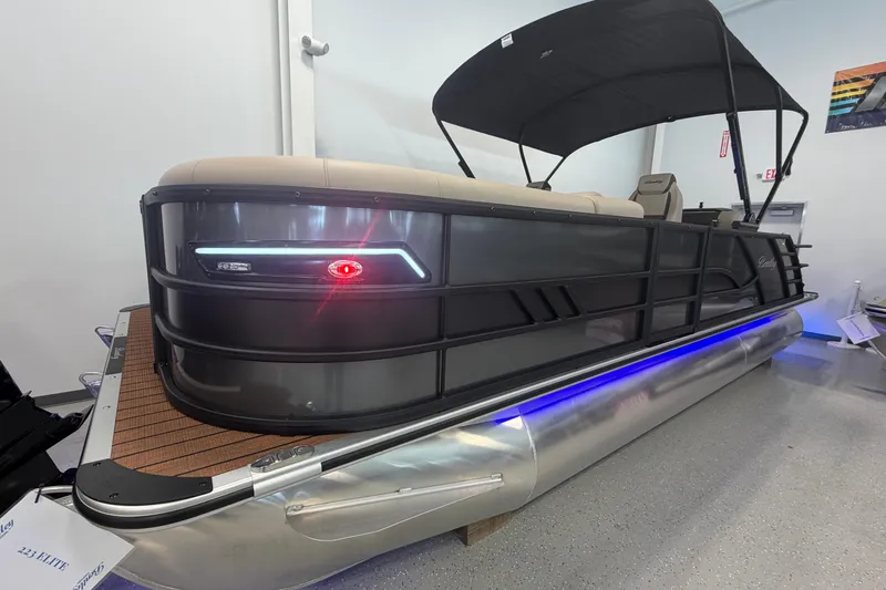 Slide: The Image of 2026 Bentley Pontoons Elite 223 Swingback with sleek design and modern lighting. - 3