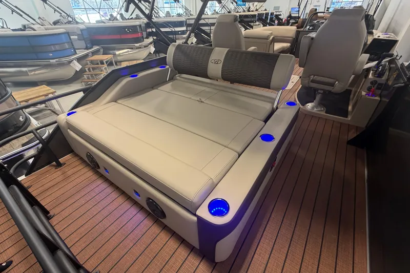 Slide: The Image of 2026 Bentley Pontoons Elite 223 Swingback with luxurious seating and ambient lighting. - 9