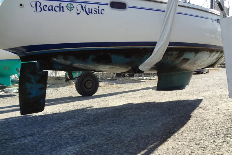 Slide: The Image of Catalina 36 MkII sailboat, 2000 model, named "Beach Music," on dry dock. - 19