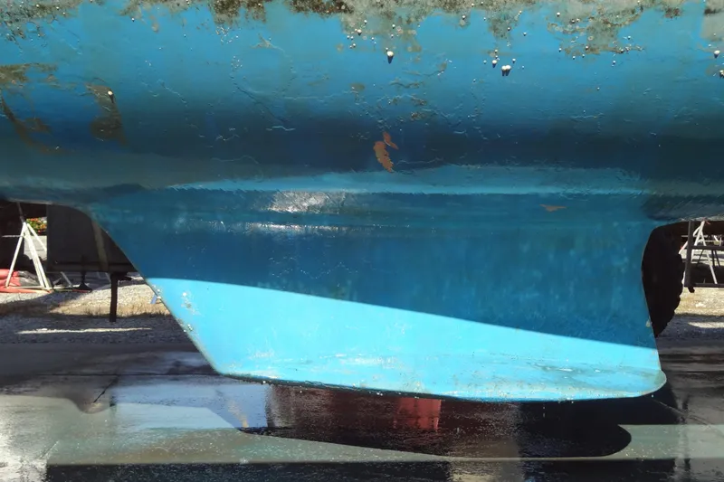 Slide: The Image of Bottom view of a 2000 Catalina 36 MkII sailboat hull with blue paint. - 20
