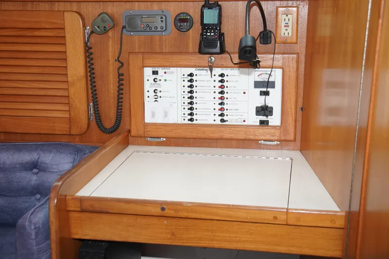 Slide: The Image of Control panel of a 2000 Catalina 36 MkII sailboat with communication devices. - 28