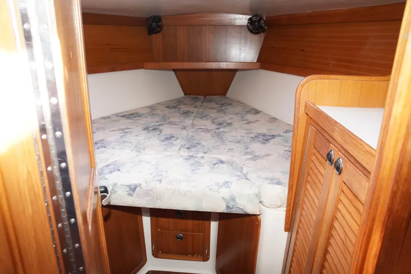 Slide: The Image of Interior cabin of a 2000 Catalina 36 MkII sailboat with wooden finishes. - 31
