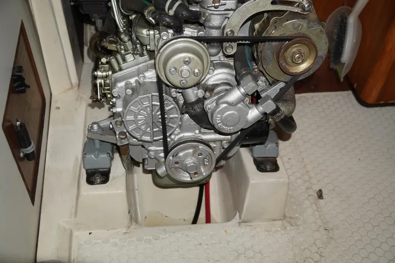 Slide: The Image of Engine compartment of a 2000 Catalina 36 MkII sailboat, showcasing mechanical components. - 40