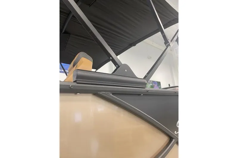 Slide: The Image of 2026 Bentley Pontoons Elite 253 Swingback, close-up of sleek design and structure. - 24