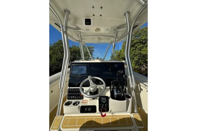 Slide: The Image of 2007 Hydra-Sports Vector 3300 CC boat helm with steering wheel and controls. - 9