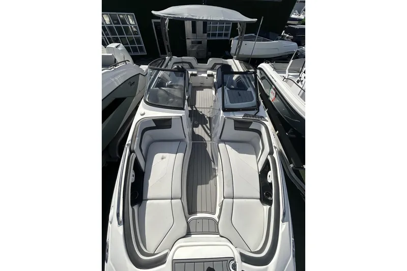 Slide: The Image of 2019 Yamaha AR-240 boat interior with sleek seating and modern design. - 19