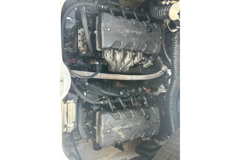 Slide: The Image of 2019 Yamaha AR-240 high output engine, showcasing intricate wiring and components. - 21