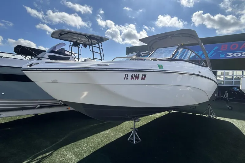 Slide: The Image of 2019 Yamaha AR-240 boat displayed outdoors under a clear blue sky. - 5