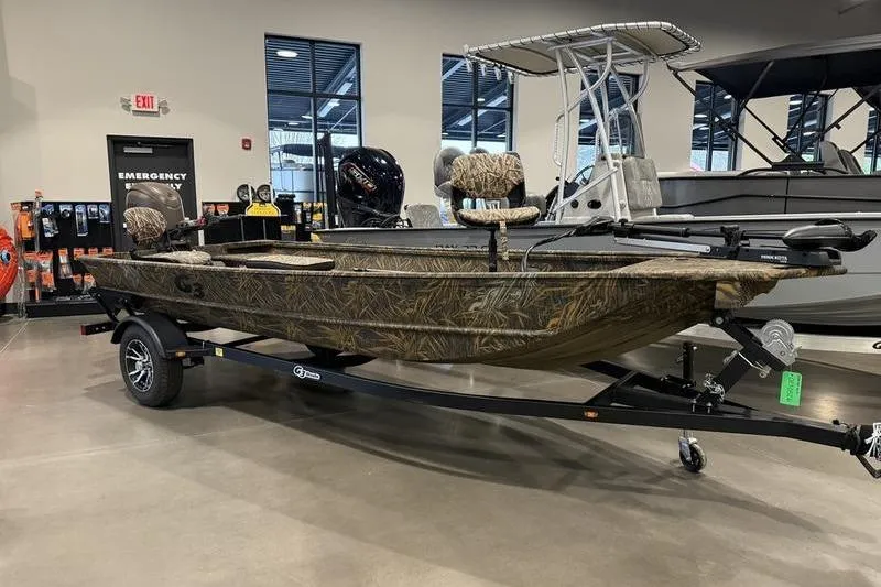 The Image of 2026 G3 Gator Tough 16 FL boat on trailer in showroom. - 0