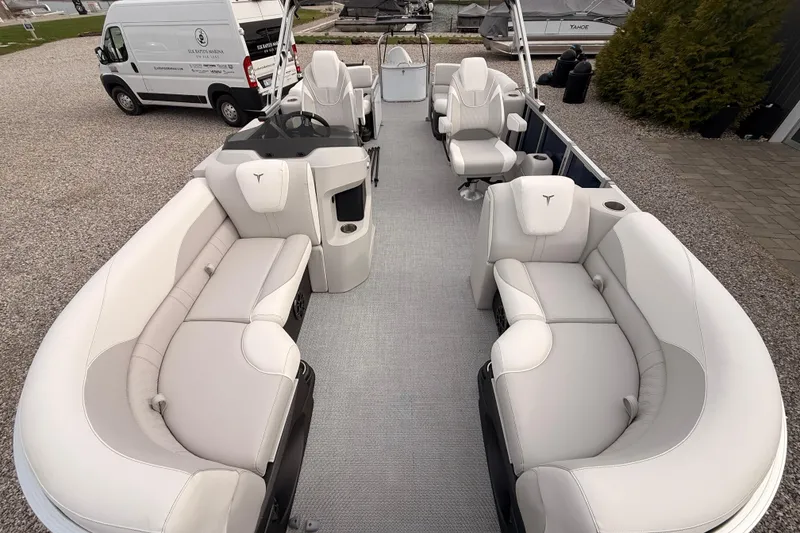 Slide: The Image of 2026 Tahoe Pontoon LTZ Quad Lounger with luxurious seating and modern design. - 10