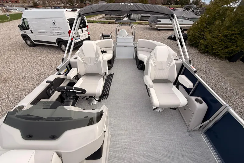 Slide: The Image of 2026 Tahoe Pontoon LTZ Quad Lounger with spacious seating and modern design. - 11