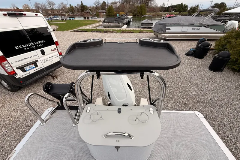 Slide: The Image of 2026 Tahoe Pontoon LTZ Quad Lounger at Elk Rapids Marina, featuring a sleek design. - 13