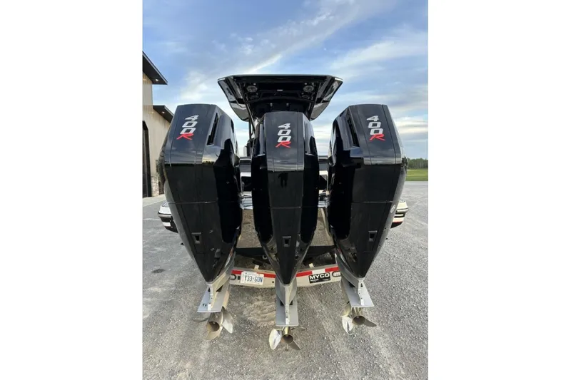 Slide: The Image of Triple 400R engines on a 2024 Nor-Tech 340 Sport Center Console boat. - 8
