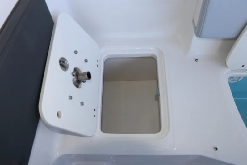 Slide: The Image of 2026 Chaparral 21 SSi Ski & Fish OB boat storage compartment detail. - 14