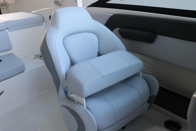 Slide: The Image of 2026 Chaparral 21 SSi Ski & Fish OB boat interior with plush seating. - 18