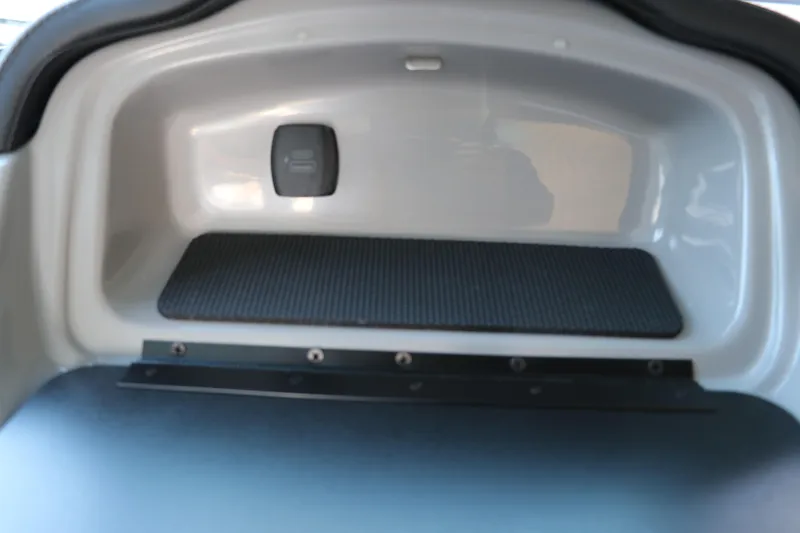 Slide: The Image of Storage compartment of 2026 Chaparral 21 SSi Ski & Fish OB boat. - 21