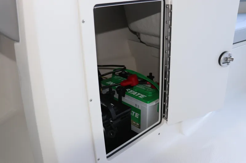Slide: The Image of Battery compartment of 2026 Chaparral 21 SSi Ski & Fish OB boat. - 23