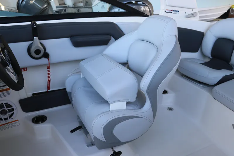 Slide: The Image of 2026 Chaparral 21 SSi Ski & Fish OB boat interior with plush seating. - 28