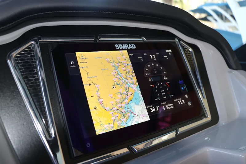 Slide: The Image of Simrad navigation display on 2026 Chaparral 21 SSi Ski & Fish OB boat dashboard. - 30