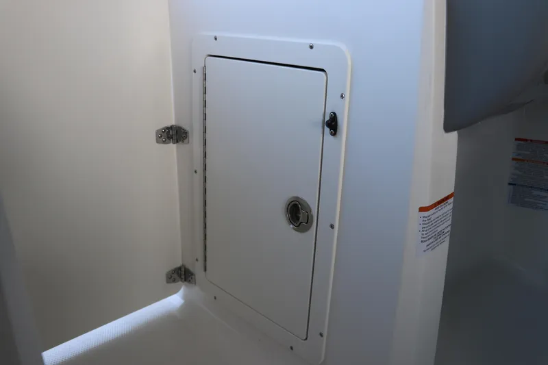Slide: The Image of Storage compartment on 2026 Chaparral 21 SSi Ski & Fish OB boat. - 33