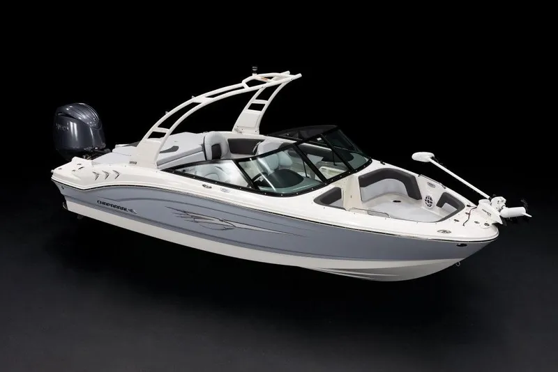 Slide: The Image of 2026 Chaparral 21 SSi Ski & Fish OB boat interior with cushioned seating and outboard motor. - 4