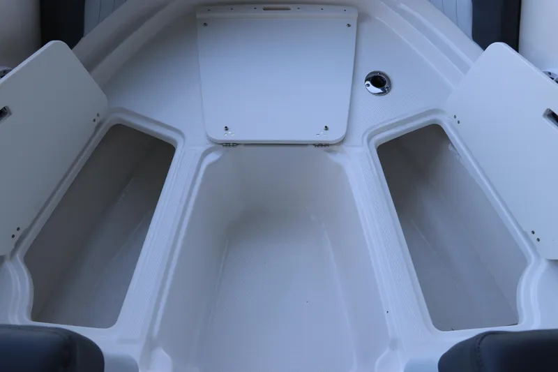 Slide: The Image of 2026 Chaparral 21 SSi Ski & Fish OB boat interior storage compartments. - 40
