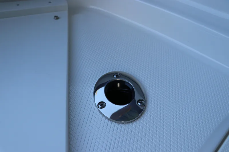 Slide: The Image of Close-up of a 2026 Chaparral 21 SSi Ski & Fish OB boat deck detail. - 42