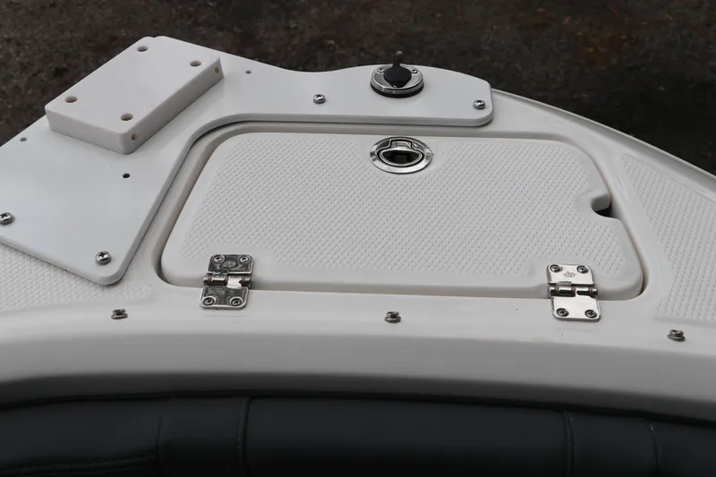 Slide: The Image of 2026 Chaparral 21 SSi Ski & Fish OB boat deck with storage compartment. - 44