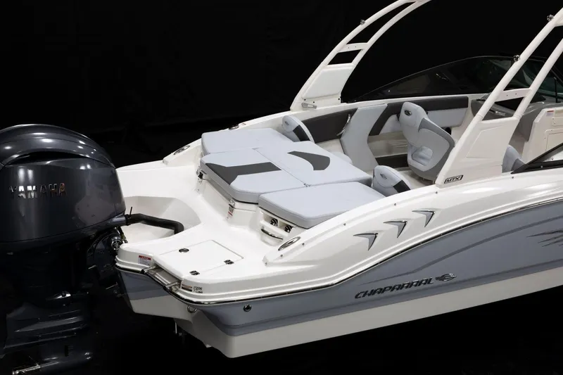 Slide: The Image of 2026 Chaparral 21 SSi Ski & Fish OB storage compartment with netting. - 6