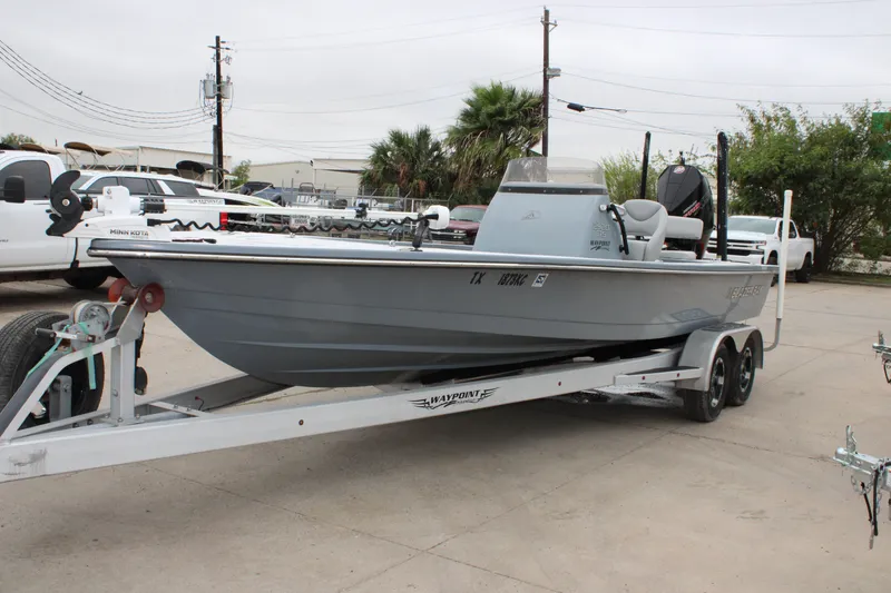 Slide: The Image of 2021 Blazer 2420 GTS boat on trailer, parked outdoors. - 3