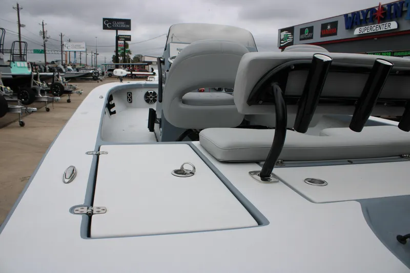 Slide: The Image of 2021 Blazer 2420 GTS boat interior with seating and storage compartments. - 8