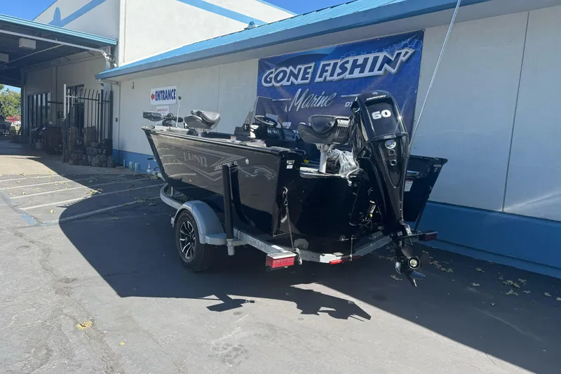 Slide: The Image of 2026 Lund 1650 Rebel XL SS boat with Mercury 60 engine at dealership. - 7