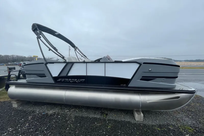 The Image of 2026 Starcraft VX 20 FD pontoon boat on display, featuring sleek design and modern features. - 1