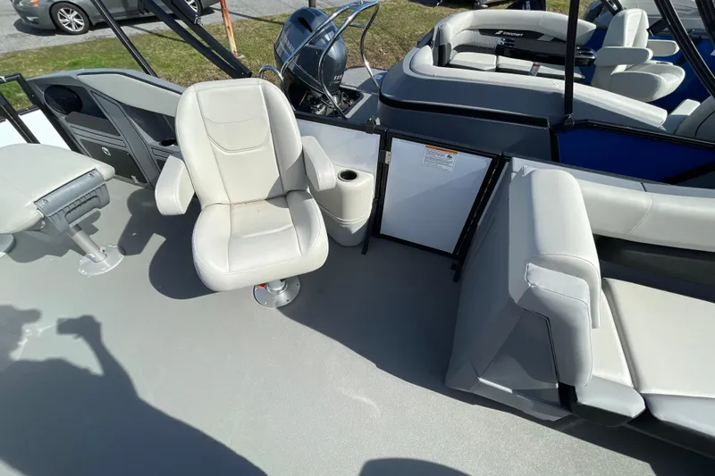 Slide: The Image of Interior of 2026 Starcraft VX 20 FD boat with white seating and modern design. - 15