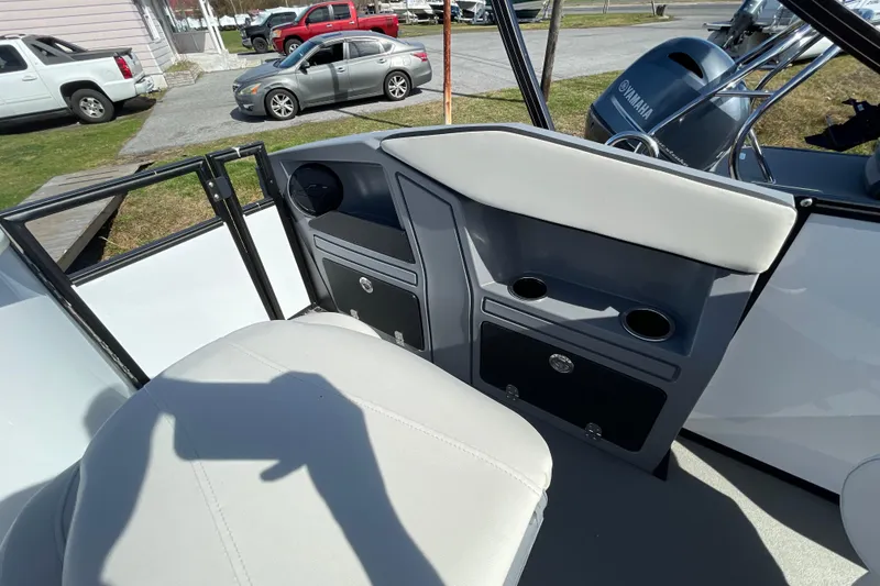 Slide: The Image of Interior of 2026 Starcraft VX 20 FD boat with seating and storage compartments. - 6