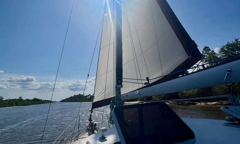 Slide: The Image of Sailing on a 1986 Cape Dory MS300 under clear blue skies. - 9