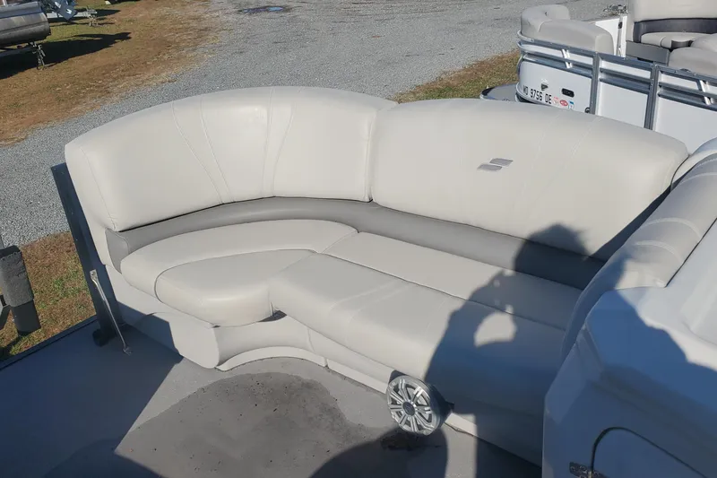 Slide: The Image of 2018 Starcraft SLS 3 boat seating with beige upholstery and speaker. - 3