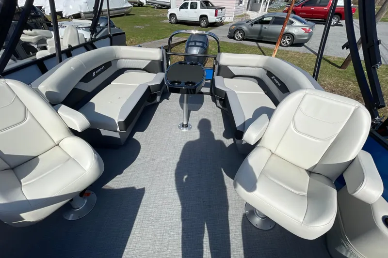 Slide: The Image of 2026 Starcraft VX 20 R DH boat interior with plush seating and central table. - 3