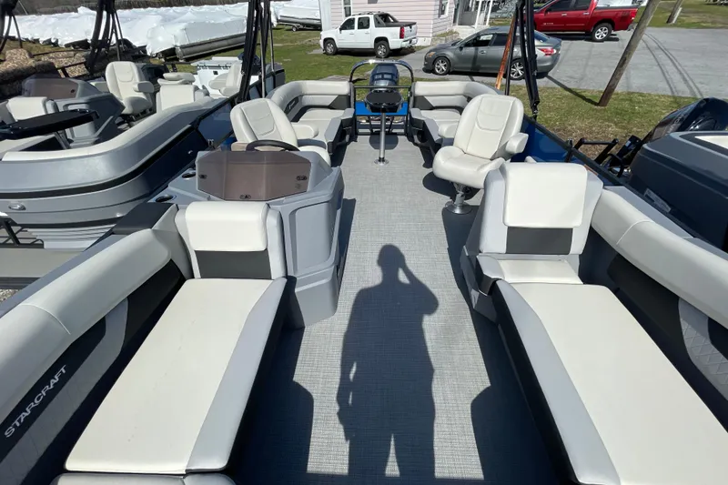 Slide: The Image of Interior of 2026 Starcraft VX 20 R DH pontoon boat with spacious seating. - 5