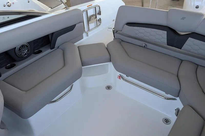 Slide: The Image of Luxurious seating area on 2026 Four Winns HD5 OB boat with modern design. - 10
