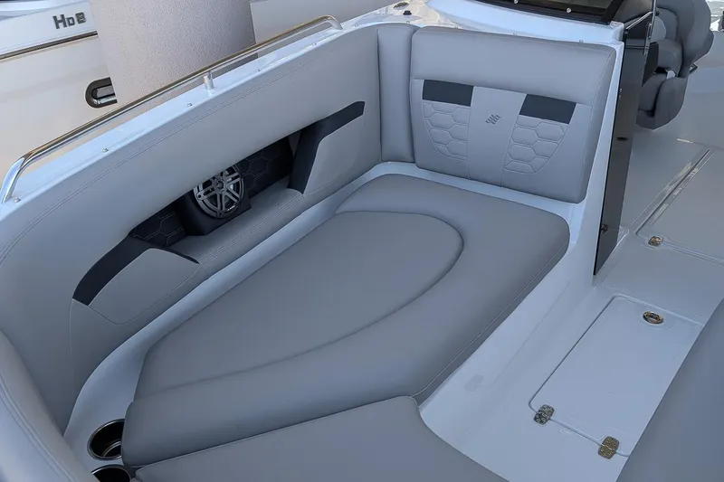 Slide: The Image of Luxurious seating on 2026 Four Winns HD5 OB boat with integrated speaker system. - 19