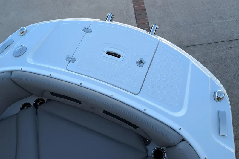 Slide: The Image of 2026 Four Winns HD5 OB boat deck with seating and storage compartments. - 21