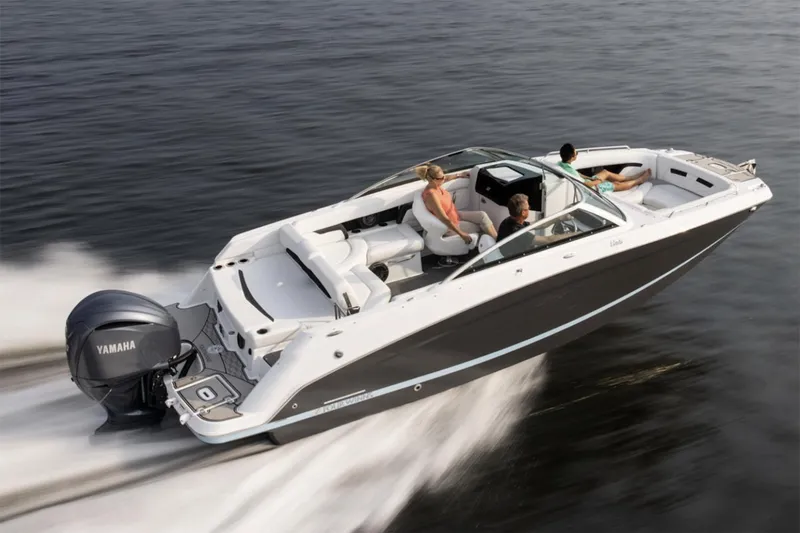 Slide: The Image of Manufacturer Provided Image: 2025 Four Winns HD5 OB boat cruising on water with Yamaha outboard engine. - 23