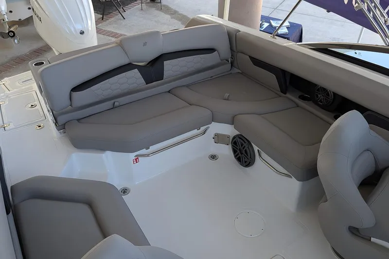 Slide: The Image of 2026 Four Winns HD5 OB boat interior with gray seating and modern design. - 6