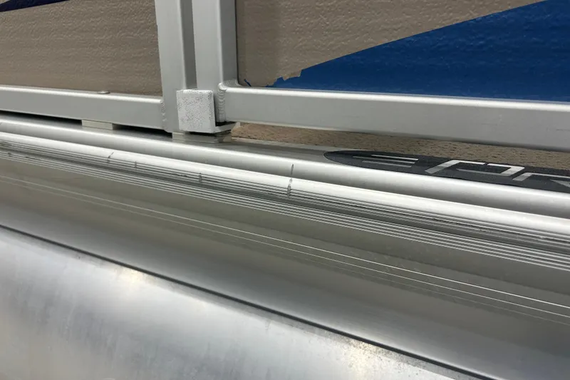 Slide: The Image of Close-up of 2009 Premier 240 SunSpree boat's aluminum railing and paneling. - 9