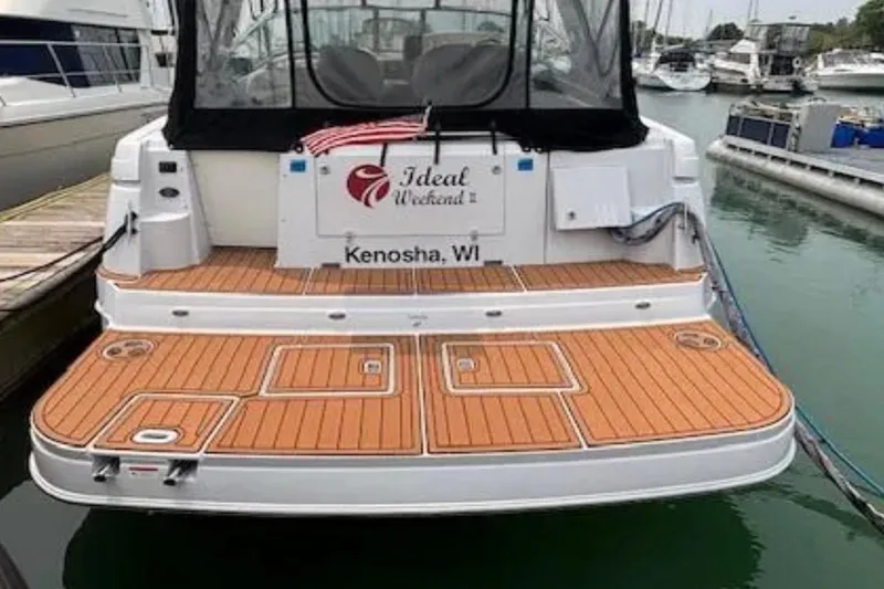 Slide: The Image of 2007 Four Winns 378 Vista boat docked, featuring teak swim platform, Kenosha, WI. - 18