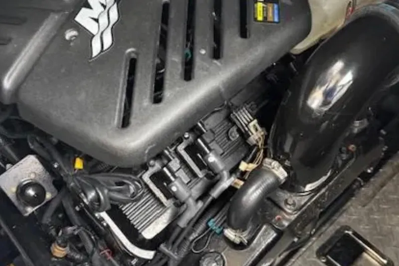 Slide: The Image of Engine of 2007 Four Winns 378 Vista boat, showcasing mechanical components. - 5