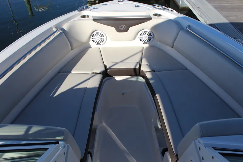 Slide: The Image of Interior of 2024 Sailfish 226DC boat with cushioned seating. - 12
