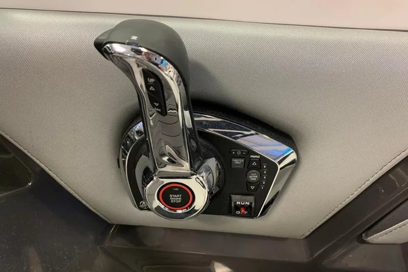 Slide: The Image of 2024 Monterey 238SS Super Sport throttle control with start/stop button and profile settings. - 12